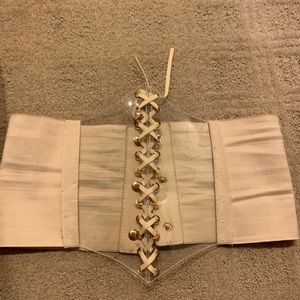 Cream lace up corset belt. Size medium.